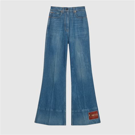 gucci flare denim|Denim flare trouser with Gucci label.